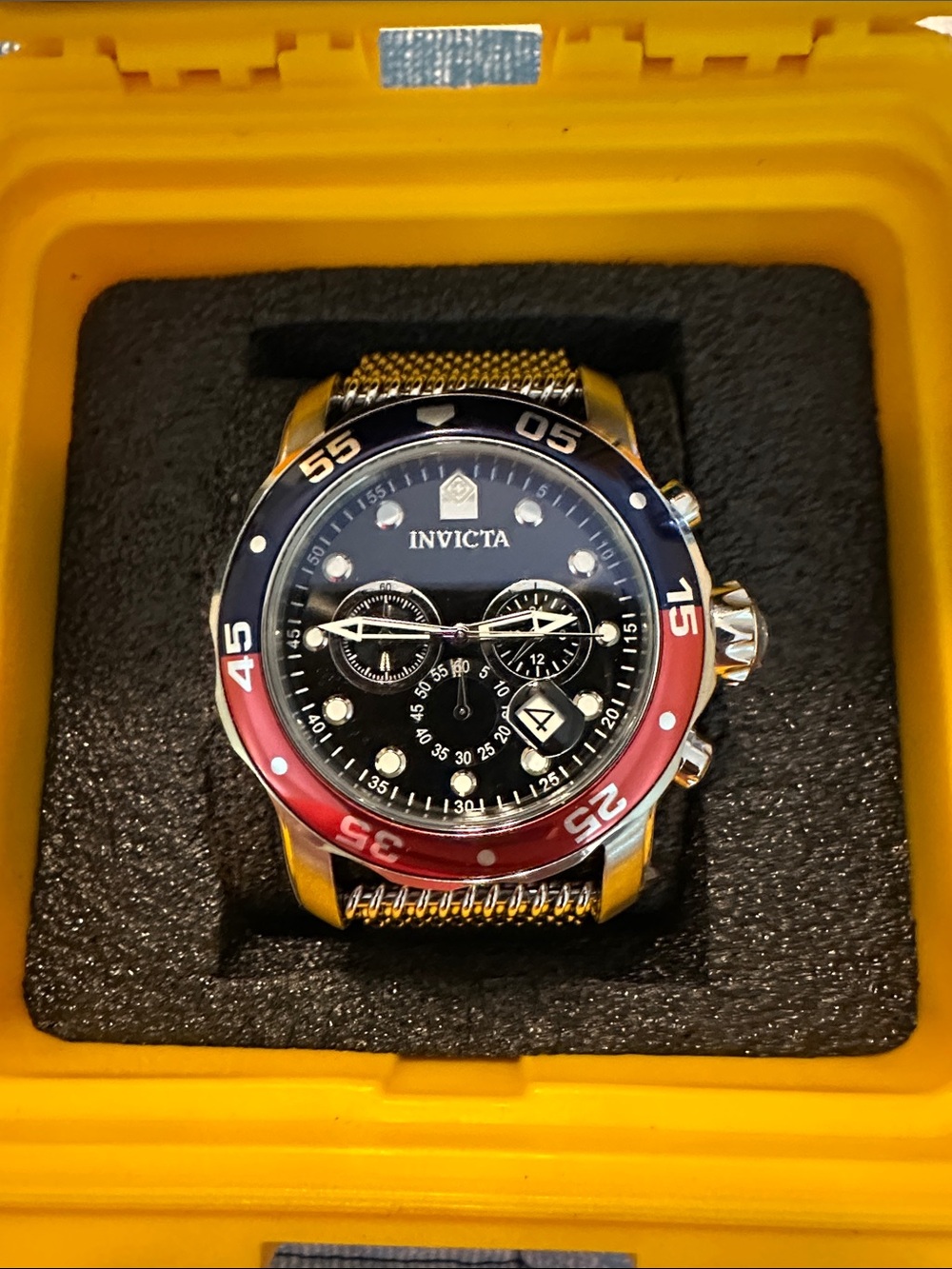 Invicta Pro Diver Black Dial Chronograph Watch with Red and Blue Bezel 52mm.
